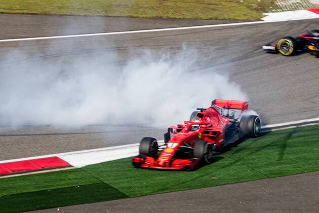 Themen der Woche - SPORT KW15 Bilder des Tages - SPORT German F1 Sebastian Vettel of Ferrari and Dutch F1 driver Max Verstappen of Red Bull Racing collide as they compete during the 2018 Formula One Chinese Grand Prix at the Shanghai International Circuit in Shanghai, China, 15 April 2018. Daniel Ricciardo charged from sixth to score a stunning first win of the 2018 Formula 1 season as Max Verstappen and Sebastian Vettel collided in a wild Chinese Grand Prix. Bottas and Vettel were locked in their own battle for the win until Ricciardo and Verstappen pitted again for fresh, soft tyres during a safety car period just after the halfway mark as their rivals stayed on mediums. Ricciardo then overtook his team-mate, Lewis Hamilton and Vettel in quick succession before executing a stunning pass on Bottas into the tight Turn 6 right-hander for the victory. Verstappen and Vettel collide in Chinese Grand Prix 