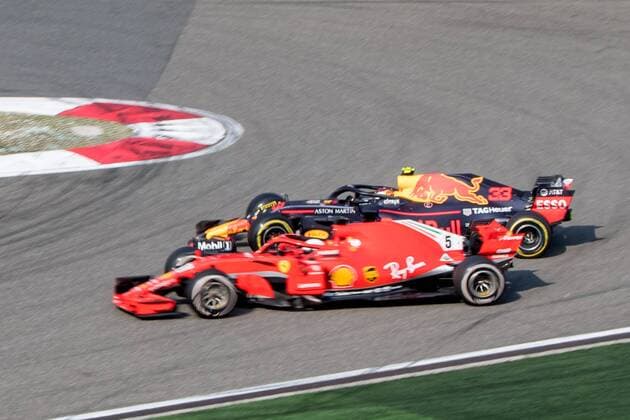 German F1 Sebastian Vettel of Ferrari and Dutch F1 driver Max Verstappen of Red Bull Racing collide as they compete during the 2018 Formula One Chinese Grand Prix at the Shanghai International Circuit in Shanghai, China, 15 April 2018. Daniel Ricciardo charged from sixth to score a stunning first win of the 2018 Formula 1 season as Max Verstappen and Sebastian Vettel collided in a wild Chinese Grand Prix. Bottas and Vettel were locked in their own battle for the win until Ricciardo and Verstappen pitted again for fresh, soft tyres during a safety car period just after the halfway mark as their rivals stayed on mediums. Ricciardo then overtook his team-mate, Lewis Hamilton and Vettel in quick succession before executing a stunning pass on Bottas into the tight Turn 6 right-hander for the victory. Verstappen and Vettel collide in Chinese Grand Prix 
