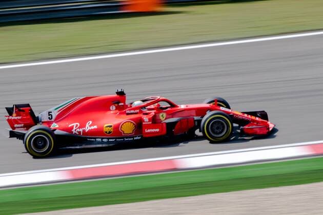 German F1 Sebastian Vettel of Ferrari competes during the 2018 Formula One Chinese Grand Prix at the Shanghai International Circuit in Shanghai, China, 15 April 2018. Daniel Ricciardo charged from sixth to score a stunning first win of the 2018 Formula 1 season as Max Verstappen and Sebastian Vettel collided in a wild Chinese Grand Prix. Bottas and Vettel were locked in their own battle for the win until Ricciardo and Verstappen pitted again for fresh, soft tyres during a safety car period just after the halfway mark as their rivals stayed on mediums. Ricciardo then overtook his team-mate, Lewis Hamilton and Vettel in quick succession before executing a stunning pass on Bottas into the tight Turn 6 right-hander for the victory. Daniel Ricciardo storms to Chinese Grand Prix victory for Red Bull 