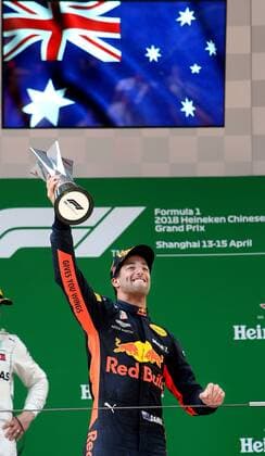 (180415) -- SHANGHAI, April 15, 2018 -- Red Bull s driver Daniel Ricciardo of Australia celebrates with his trophy on the podium after winning the Formula One Chinese Grand Prix in Shanghai, east China, April 15, 2018. Daniel Ricciardo claimed the title of the event in 1 hour, 35 minutes and 36.380 seconds. )(dx) (SP)CHINA-SHANGHAI-F1-CHINESE GRAND PRIX (CN) FanxJun 