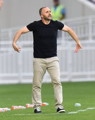 (180418) -- DOHA, April 18, 2018 -- Al Duhail SC head coach Djamel Belmadi reacts during the AFC Champions League Group B soccer match between Qatar s AL Duhail SC and UAE s Al Wahda FSCC at Abdullah bin Khalifa Stadium in Doha, Qatar, April 17, 2018. Al Duhail won 1-0. ) (SP)QATAR-DOHA-SOCCER-AFC CHAMPIONS Nikku 