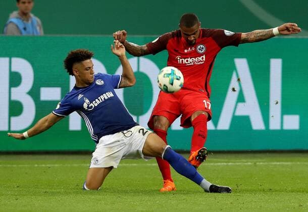 Bilder des Tages - SPORT (180419) -- GELSENKIRCHEN, April 19, 2018 -- Kevin-Prince Boateng (R) of Eintracht Frankfurt and Thilo Kehrer of Schalke 04 vie for the ball during the German DFB Pokal match between Schalke 04 and Eintracht Frankfurt at the Veltins Arena in Gelsenkirchen Germany, on April 18, 2018. ) (SP)GERMANY-GELSENKIRCHEN-SOCCER-GERMAN DFB-SEMIFINAL JoachimxBywaletz 