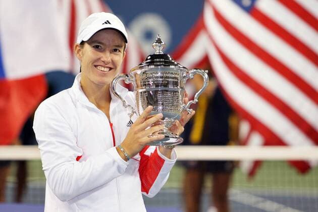 - NEW YORK, USA: Belgian Justine Henin celebrates with her trophy after defeating Russian Svetlana Kuznetsova in the US Open Women s final at the USTA National Tennis Center in Flushing Meadows, New York, 08 September 2007. It s the 7th Grand Slam title that she won in her carreer and it is the second time that she won the US Open. Henin won with 6-1,6-3. PHILIPPExBUISSIN  x7390074x