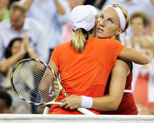 - NEW YORK, USA: (L-R) Belgian winner Justine Henin hugs Russian Svetlana Kuznetsova after winning the US Open Women s final at the USTA National Tennis Center in Flushing Meadows, New York, 08 September 2007. It s the 7th Grand Slam title that she won in her carreer and it is the second time that she won the US Open. Henin won with 6-1,6-3. PHILIPPExBUISSIN  x7390123x