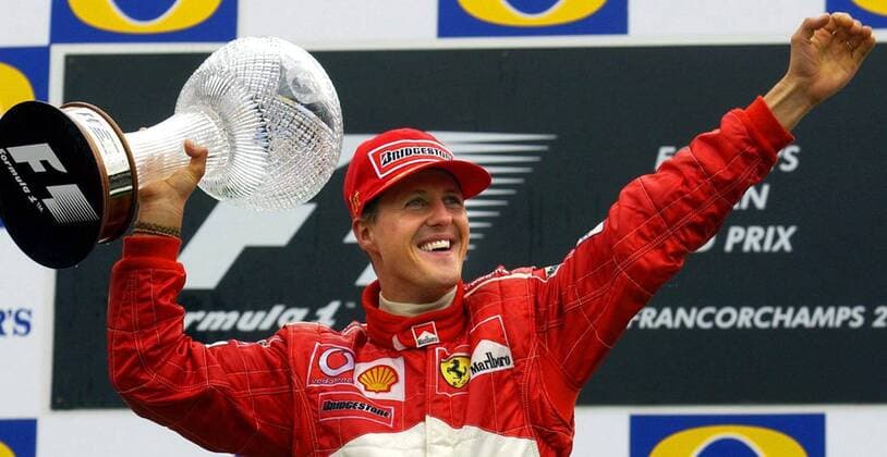 BRU162 - - FRANCORCHAMPS, BELGIUM : German Formula One World Champion Michael Schumacher pictured on the first place of the Belgian F1 Grand Prix, 01 September 2002, on the race track of Spa - Francorchamps. OLIVIERxHOSLET  x1034533x