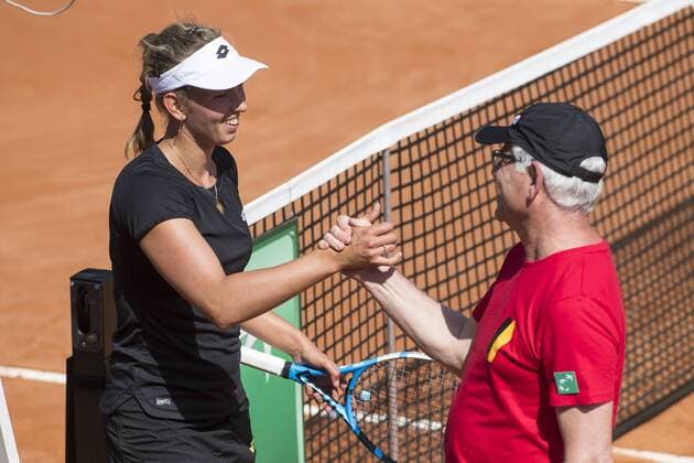 Belgian Elise Mertens and Belgian captain Ivo Van Aken celebrate after winning a tennis game between Italian Jasmine Paolini WTA Tennis Damen 145) and Belgian Elise Mertens (WTA 17), the first rubber of this weekend s Fed Cup World Group Play Off meeting between Italy and Belgium in Genoa, Italy, Saturday 21 April 2018. LAURIExDIEFFEMBACQ  x05333219x