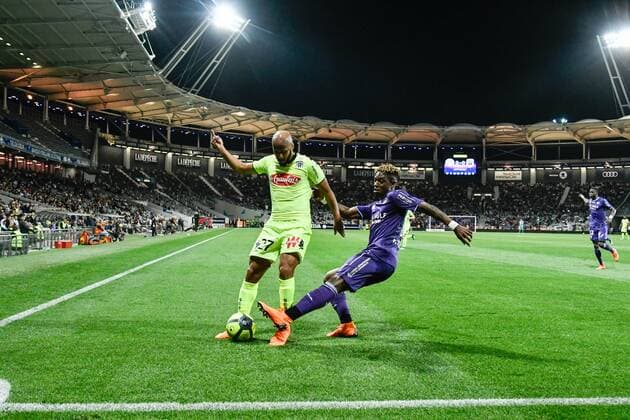 Thomas Toure (sco) vs Jacques Moubandje (tfc) FOOTBALL : Toulouse vs Angers - 34eme Journee de L1 - Toulouse - 21 04 2018 ThierryBreton Panoramic 