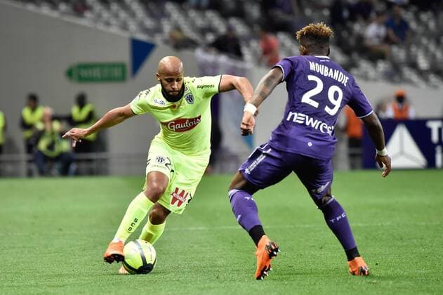 Thomas Toure (sco) vs Jacques Moubandje (tfc) FOOTBALL : Toulouse vs Angers - 34eme Journee de L1 - Toulouse - 21 04 2018 ThierryBreton Panoramic 