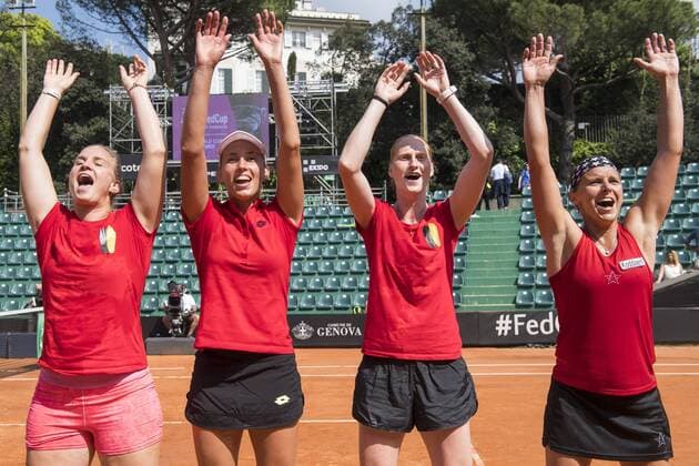 Belgian Ysaline Bonaventure, Belgian Elise Mertens, Belgian Alison Van Uytvanck and Belgian Kirsten Flipkens celebrate after winning a double tennis game between Italian pair Deborah Chiesa and Jessica Pieri and Belgian pair Kirsten Flipkens and Elise Mertens, the fourth rubber of this weekend s Fed Cup World Group Play Off meeting between Italy and Belgium in Genoa, Italy, Sunday 22 April 2018. Belgian already won 0-3. LAURIExDIEFFEMBACQ  x05334173x