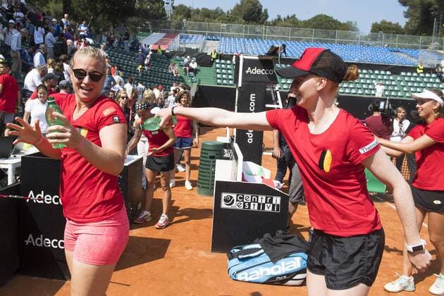 Belgian Ysaline Bonaventure and Belgian Alison Van Uytvanck celebrate after winning a double tennis game between Italian pair Deborah Chiesa and Jessica Pieri and Belgian pair Kirsten Flipkens and Elise Mertens, the fourth rubber of this weekend s Fed Cup World Group Play Off meeting between Italy and Belgium in Genoa, Italy, Sunday 22 April 2018. Belgian already won 0-3. LAURIExDIEFFEMBACQ  x05334226x