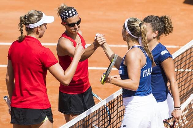 Belgian Elise Mertens, Belgian Kirsten Flipkens, Italian Deborah Chiesa and Italian Jasmine Paolini pictured during a double tennis game between Italian pair Deborah Chiesa and Jasmine Paolini and Belgian pair Kirsten Flipkens and Elise Mertens, the fourth rubber of this weekend s Fed Cup World Group Play Off meeting between Italy and Belgium in Genoa, Italy, Sunday 22 April 2018. Belgian already won 0-3. LAURIExDIEFFEMBACQ  x05334257x