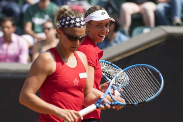 Belgian Kirsten Flipkens and Belgian Elise Mertens pictured during a double tennis game between Italian pair Deborah Chiesa and Jasmine Paolini and Belgian pair Kirsten Flipkens and Elise Mertens, the fourth rubber of this weekend s Fed Cup World Group Play Off meeting between Italy and Belgium in Genoa, Italy, Sunday 22 April 2018. Belgian already won 0-3. LAURIExDIEFFEMBACQ  x05334263x