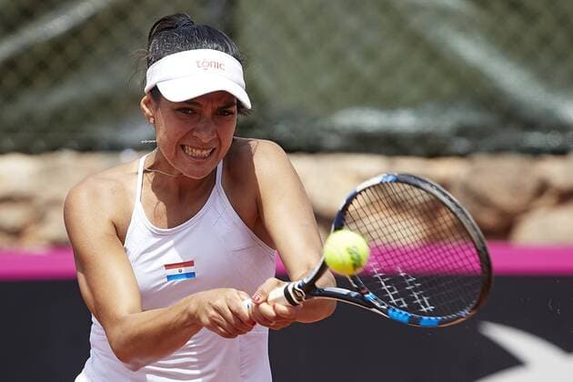 April 22, 2018 - La Manga, Murcia, Spain - Veronica Cepede Royg of Paraguay in action in her match against Garbine Muguruza of Spain during day two of the Fedcup World Group II Play-offs match between Spain and Paraguay at Centro de Tenis La Manga Club on April 22, 2018 in La Manga, Spain Spain v Paraguay - Fed Cup by BNP Paribas World Cup Group II Play-Off  - ZUMAn230 20180422_zaa_n230_676 Copyright: xDavidxAliagax