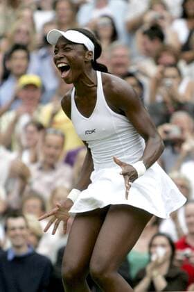 BRU108 - - WIMBLEDON, UNITED KINGDOM : US Venus Williams jumps delighted after defeating Lindsay Davenport in their final match of the Wimbledon Tennis Open, Saturday 02 July 2005, at the All England Lawn Tennis Club. DIDIER MOSSIAT DIDIERxMOSSIOAT  x3128038x