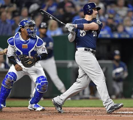 April 24, 2018 - Kansas City, MO, USA - The Milwaukee Brewers Travis Shaw watches his three-run home run in front of Kansas City Royals catcher Salvador Perez in the third inning on Wednesday, April 24, 2018, at Kauffman Stadium in Kansas City, Mo. Milwaukee at Kansas City - ZUMAm67_ 20180424_zaf_m67_023 Copyright: xJohnxSleezerx