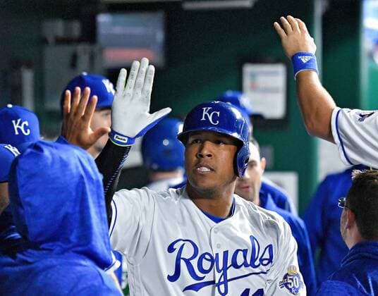April 24, 2018 - Kansas City, MO, USA - The Kansas City Royals Salvador Perez is congratulated after hitting a solo home run in the fourth inning against the Milwaukee Brewers on Wednesday, April 24, 2018, at Kauffman Stadium in Kansas City, Mo. Milwaukee at Kansas City - ZUMAm67_ 20180424_zaf_m67_026 Copyright: xJohnxSleezerx