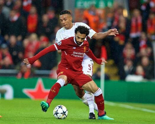 (180425) -- LIVERPOOL, April 25, 2018() -- Liverpool s Mohamed Salah (Front) controls the ball during the UEFA Champions League Semifinals 1st leg match between Liverpol FC and AS Roma at the Anfield Stadium in Liverpool, Britain on April 24, 2018. Liverpool won 5-2. ()(wll) (SP)BRITAIN-LIVERPOOL-SOCCER-UEFA-CHAMPIONS LEAGUE-LIVERPOOL VS ROMA Xinhua 