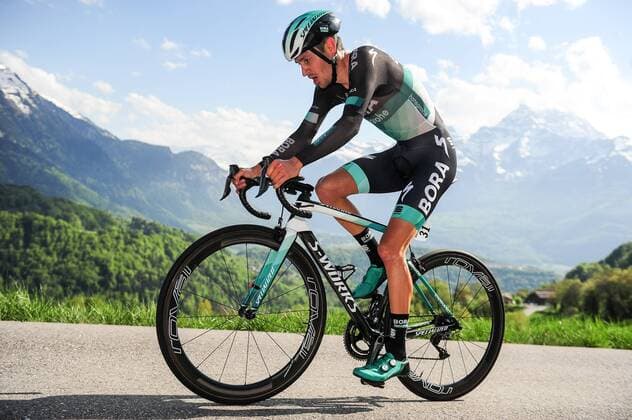 Emanuel Buchmann ( GER BORA-hansgrohe ) - Aktion Action - Rennszene - Querformat - quer - horizontal - Veranstaltung Event: 72. Tour de Romandie - 3.Etappe Stage 3: Ollon to Villars 9.9 km I.T.T. - Ort Place: Villars - Schweiz Suisse Switzerland - Europa Europe Datum Date: 27.04.2018