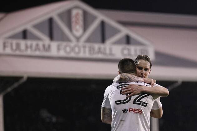 Aleksander Mitrovic of Fulham is congratulated by Stefan Johansen during the EFL Sky Bet Championship match between Fulham and Sunderland at Craven Cottage, London, England on 27 April 2018. Copyright: xCarltonxMyriex 19810013
