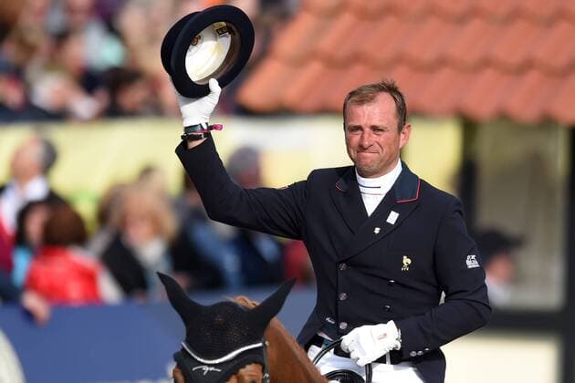 Dressur - Horses and Dreams 2018 - CDI4* GP FS - Grand Prix Freestyle to Music am 28.04.2018 auf dem Hof Kasselmann in Hagen a.T.W. Pierre Volla (Frankreich) freut sich.