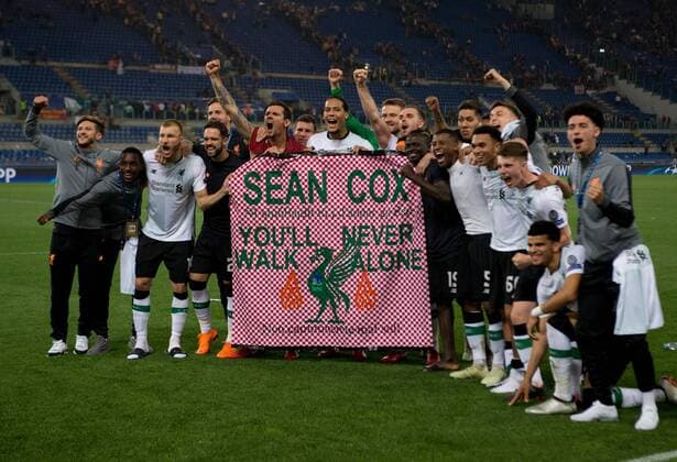 A.S. Roma v Liverpool UEFA Champions League Semi-Final Liverpool players hold up a flag featuring the name of Sean Cox following the UEFA Champions League Semi-Final match at the Stadio Olimpico, Rome Content Not Available For UK Newspapers Copyright: xRussellxHartx FIL-11735-0052