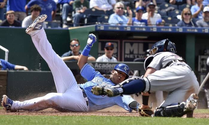 May 3, 2018 - Kansas City, MO, USA - Kansas City Royals Salvador Perez scores behind Detroit Tigers catcher James McCann on a single by Lucas Duda in the fifth inning during Thursday s baseball game on May 3, 2018, at Kauffman Stadium in Kansas City, Mo. Tigers vs Royals - ZUMAm67_ 20180503_zaf_m67_043 Copyright: xJohnxSleezerx