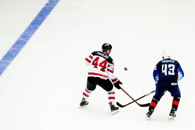 180504 Jean-Gabriel Pageau of Canada and Quinn Hughes of USA during the IIHF Ice hockey Eishockey World Championship WM Weltmeisterschaft match between USA and Canada on May 4, 2018 in Herning. Photo: Vegard Wivestad Gr¿tt BILDBYRN kod VG 170149 Copyright: VEGARDxWIVESTADxGR¯TT BB180504BB221