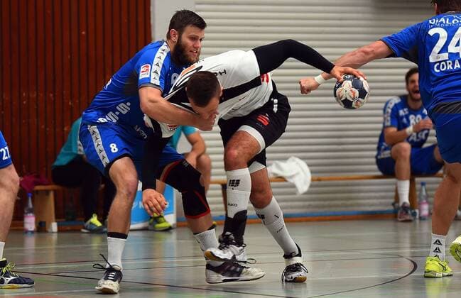 05.05.2018, xpsx, Handball 3.Liga, HSG Hanau - TV Grosswallstadt v.l. Florian Eisenträger (Grosswallstadt), Jannik Ruppert (Hanau) Hanau Hessen Deutschland