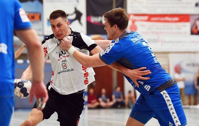 05.05.2018, xpsx, Handball 3.Liga, HSG Hanau - TV Grosswallstadt v.l. Marc Strohl (Hanau), Tom Spiess (Grosswallstadt) Hanau Hessen Deutschland