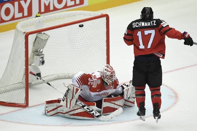 Denmark goalkeeper Sebastian Dahm ducks in front of Canadas Jaden Schwartz as Canadas Aaron Ekblad have scored the second goal IIHF World Championship WM Weltmeisterschaft Group B Ice hockey Eishockey match between Canada and Denmark in Jyske Bank Boxen Arena in Herning, Denmark, Monday, May 7, 2018.. , Herning Denmark  Copyright: LarsxMoellerx cop102 spdk20180507-204033-L