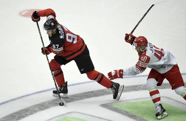 Jesper Jensen of Denmark in action against Connor McDavid of Canada during IIHF World Championship WM Weltmeisterschaft group B Ice hockey Eishockey match between Canada and Denmark in Jyske Bank Boxen in Herning, Denmark, Monday, May 7, 2018. , Herning Denmark  Copyright: LarsxMoellerx xRitzauxScanpix LarsxMoellerx cop102 spdk20180507-210511-L
