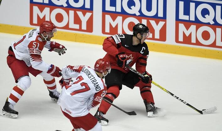Frans Nielsen and Oliver Björkstrand of Denmark in action against Connor McDavid of Canada during IIHF World Championship WM Weltmeisterschaft group B Ice hockey Eishockey match between Canada and Denmark in Jyske Bank Boxen in Herning, Denmark, Monday, May 7, 2018. , Herning Denmark  Copyright: LarsxMoellerx xRitzauxScanpix LarsxMoellerx cop102 spdk20180507-214526-L