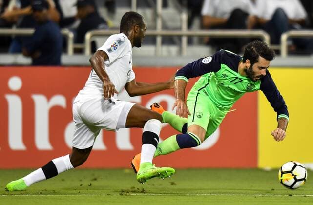 (180508) -- DOHA, May 8, 2018 -- Abdelkarim Hassan (L) of Al Sadd SC vies with Amiri Kurdi of Al Ahli Saudi during the round of 16 in the AFC Asian Champions League football match at the Jassim Bin Hamad Stadium, in Doha, capital of Qatar, May 7, 2018. Al Sadd SC won 2-1. ) (SP)QATAR-DOHA-SOCCER-AFC CHAMPIONS LEAGUE-AL SADD VS AL AHLI SAUDI Nikku 
