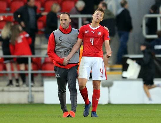 Switzerland v England UEFA EURO EM Europameisterschaft Fussball U17 U 17 Championship Ilan Sauter (r) of Switzerland is consoled after the UEFA Euro U17 Championship match at the New York Stadium, Rotherham Content Not Available For UK Newspapers Copyright: xSimonxMoorex FIL-11776-0013