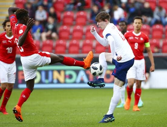 10th May, AESSEAL New York Stadium, Rotherham, England; UEFA Under 17 European Championships, Switzerland versus England; James Garner of England is fouled by Alexandre Jankewitz of Switzerland who was booked  ActionPlus12023282