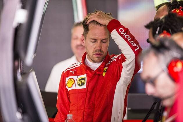 Themen der Woche - SPORT Bilder des Tages - SPORT May 11, 2018 - Montmelo, Spain - 05 Sebastian Vettel from Germany with Scuderia Ferrari SF71H portrait talking to his mechanics during the Spanish Formula One Grand Prix at Circuit de Catalunya on 11, 2018 in Montmelo, Spain. Spanish F1 Grand Prix - Practice  - ZUMAn230 20180511_zaa_n230_999 Copyright: xXavierxBonillax