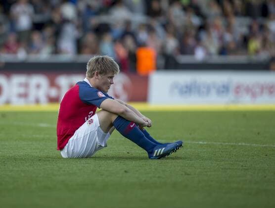 13th May 2018, Pirelli Stadium, Burton-upon-Trent, England; UEFA Under 17 European Championships, quarter final, Norway U17s versus England U17s; Harald Martin Hauso of Norway despondent on the grass after losing (0-2)  ActionPlus12024965