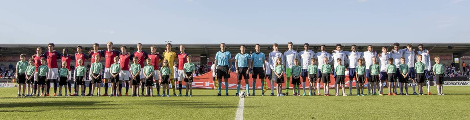 13th May 2018, Pirelli Stadium, Burton-upon-Trent, England; UEFA Under 17 European Championships, quarter final, Norway U17s versus England U17s; The Norway and England teams stand in a line on the pitch before the kick off  ActionPlus12024967