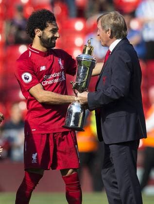 13th May 2018, Anfield, Liverpool, England; EPL Premier League football, Liverpool versus Brighton and Hove Albion; Mohamed Salah of Liverpool is presented with his Player of the Year trophy by former Liverpool manager and player Kenny Dalglish  ActionPlus12025107