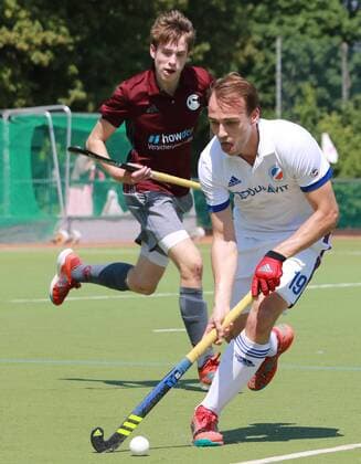 Felix Schüues (Mannheimer HC) Hockey 1. BL München 13.05.2018 Münchner SC (rot-grau) - Mannheimer HC (weiss) *** Felix Schüues Mannheim HC Hockey 1 BL Munich 13 05 2018 Munich SC red gray Mannheim HC white