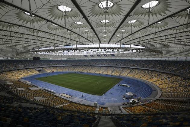 May 14, 2018 - Kiev, Ukraine - Workers prepare the NSC Olimpiyskiy stadiumfor the final match of the UEFA Champions League, Kyiv, Ukraine, May, 2018 . Kyiv for the 2018 UEFA Champions League final between Real Madrid and Liverpool has been putting the finishing touches to decorations and installing facilities with over 870,000 euros spent on infrastructure. Kyiv prepares NSC Olimpiyskiy for UCLF  - ZUMAn230 20180514_zaa_n230_673 Copyright: xSergiixKharchenkox