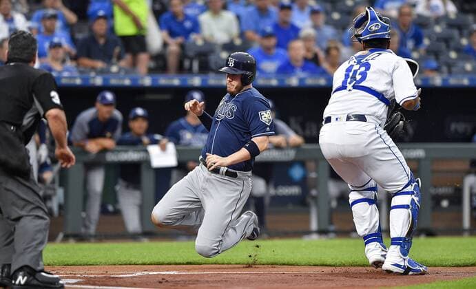 May 14, 2018 - Kansas City, MO, USA - Tampa Bay Rays C.J. Cron scores past Kansas City Royals catcher Salvador Perez on a single by Matt Duffy in the first inning during Monday s baseball game on May 14, 2018, at Kauffman Stadium in Kansas City, Mo. Royals vs Rays - ZUMAm67_ 20180514_zaf_m67_029 Copyright: xJohnxSleezerx