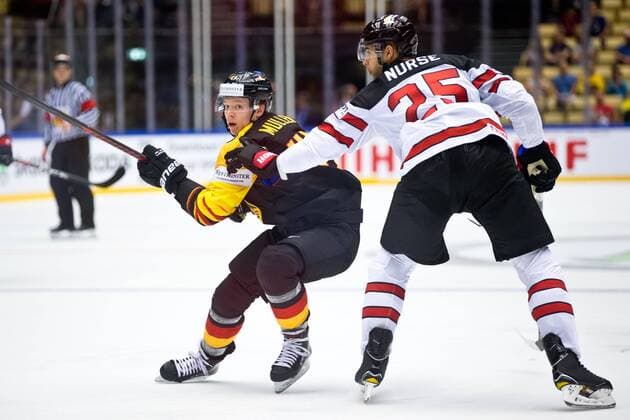 Jonas Muller 41, GER, Darnell Nurse 25, CAN during their IIHF Ice hockey Eishockey World Championship WM Weltmeisterschaft 2018 CAN - GER match in Jyske Bank Boxen 15. May 2018 in Herning, Denmark.  Copyright: xTomixHänninenx tnp24SPO1511483987