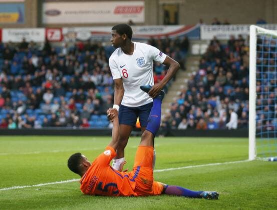 Ajibola-Joshua Alese of England helps Jurrien Maduro of the Netherlands with his cramp during the Semi Final match at the Proact Stadium, Chesterfield. Picture date 17th May 2018. Picture credit should read: Simon Bellis Sportimage EDITORIAL USE ONLY. No use with unauthorised audio, video, data, fixture lists, club league logos or live services. Online in-match use limited to 120 images, no video emulation. No use in betting, games or single club league player publications.