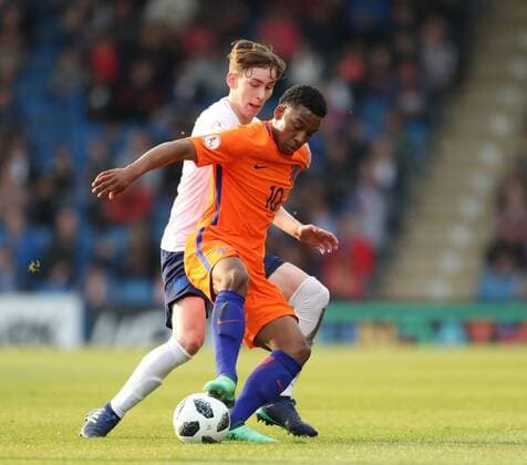 Qunten Maduro of the Netherlands tackled by James Garner of England during the Semi Final match at the Proact Stadium, Chesterfield. Picture date 17th May 2018. Picture credit should read: Simon Bellis Sportimage EDITORIAL USE ONLY. No use with unauthorised audio, video, data, fixture lists, club league logos or live services. Online in-match use limited to 120 images, no video emulation. No use in betting, games or single club league player publications.