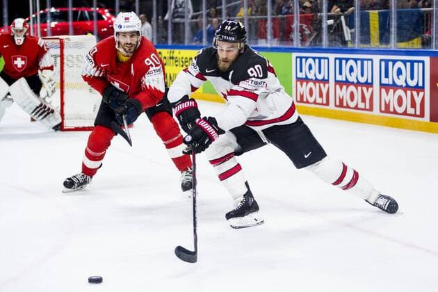180519 Schweiz Joel Roman och Kanadas Ryan O Reilly under semifinalen i ishockey-VM mellan Kanada och Schweiz den 19 maj 2018 i Köpenhamn. Copyright: LUDVIGxTHUNMAN BB180519LT118