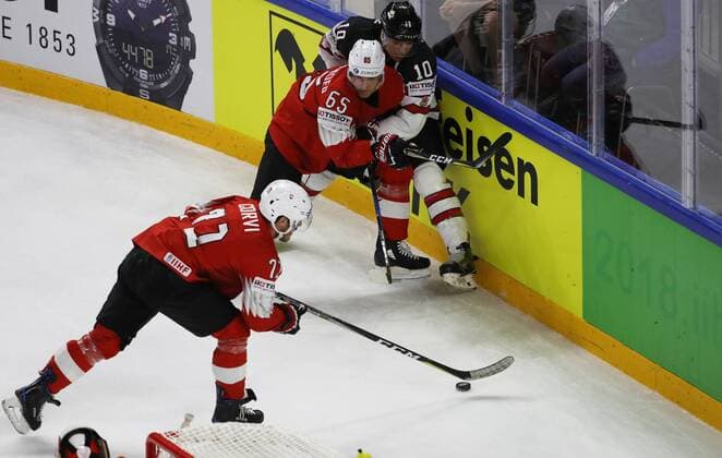 Ice hockey Eishockey - IIHF WC, CAN vs SUI COPENHAGEN,DENMARK,19.MAY.18 - ICE HOCKEY - IIHF World Championships, semifinal, Canada vs Switzerland. Image shows Enzo Corvi, Ramon Untersander (SUI) and Brayden Schenn (CAN). GEPAxpictures xAndreasxPranter