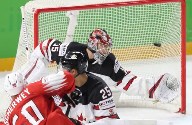 COPENHAGEN, DENMARK - MAY 19, 2018: Canadaâ€™s goaltender Darcy Kuemper (back) concedes a goal in their 2018 IIHF World Championship WM Weltmeisterschaft semi-final match against Switzerland at Royal Arena in Copenhagen. Anton Novoderezhkin TASS  TS080304