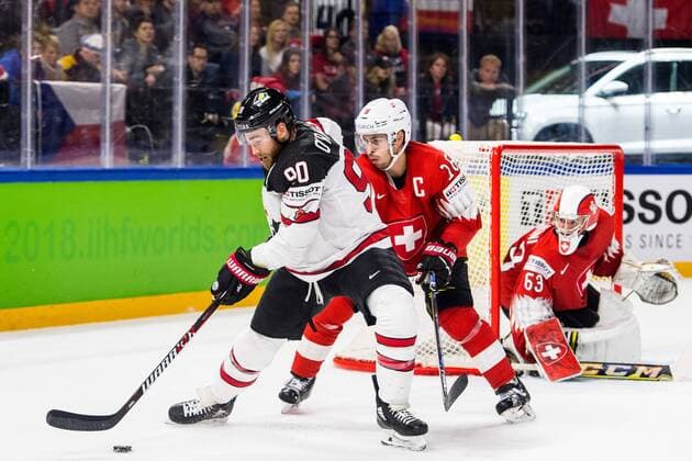 180519 Kanadas Ryan O Reilly och Schweiz Raphael Diaz under semifinalen i ishockey-VM mellan Kanada och Schweiz den 19 maj 2018 i Köpenhamn. Copyright: PETTERxARVIDSON BB180519PA158