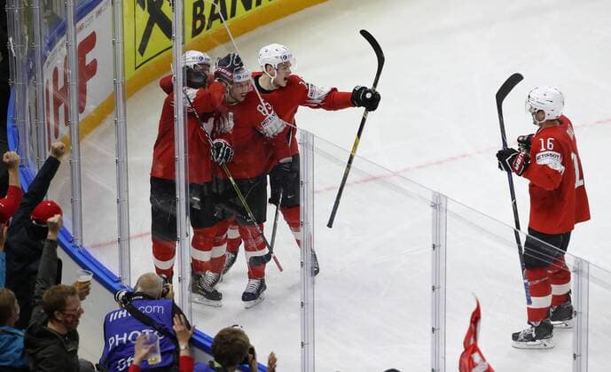 Ice hockey Eishockey - IIHF WC, CAN vs SUI COPENHAGEN,DENMARK,19.MAY.18 - ICE HOCKEY - IIHF World Championships, semifinal, Canada vs Switzerland. Image shows the rejoicing of Gaetan Haas, Sven Andrighetto, Gregory Hofmann and Raphael Diaz (SUI). GEPAxpictures xAndreasxPranter